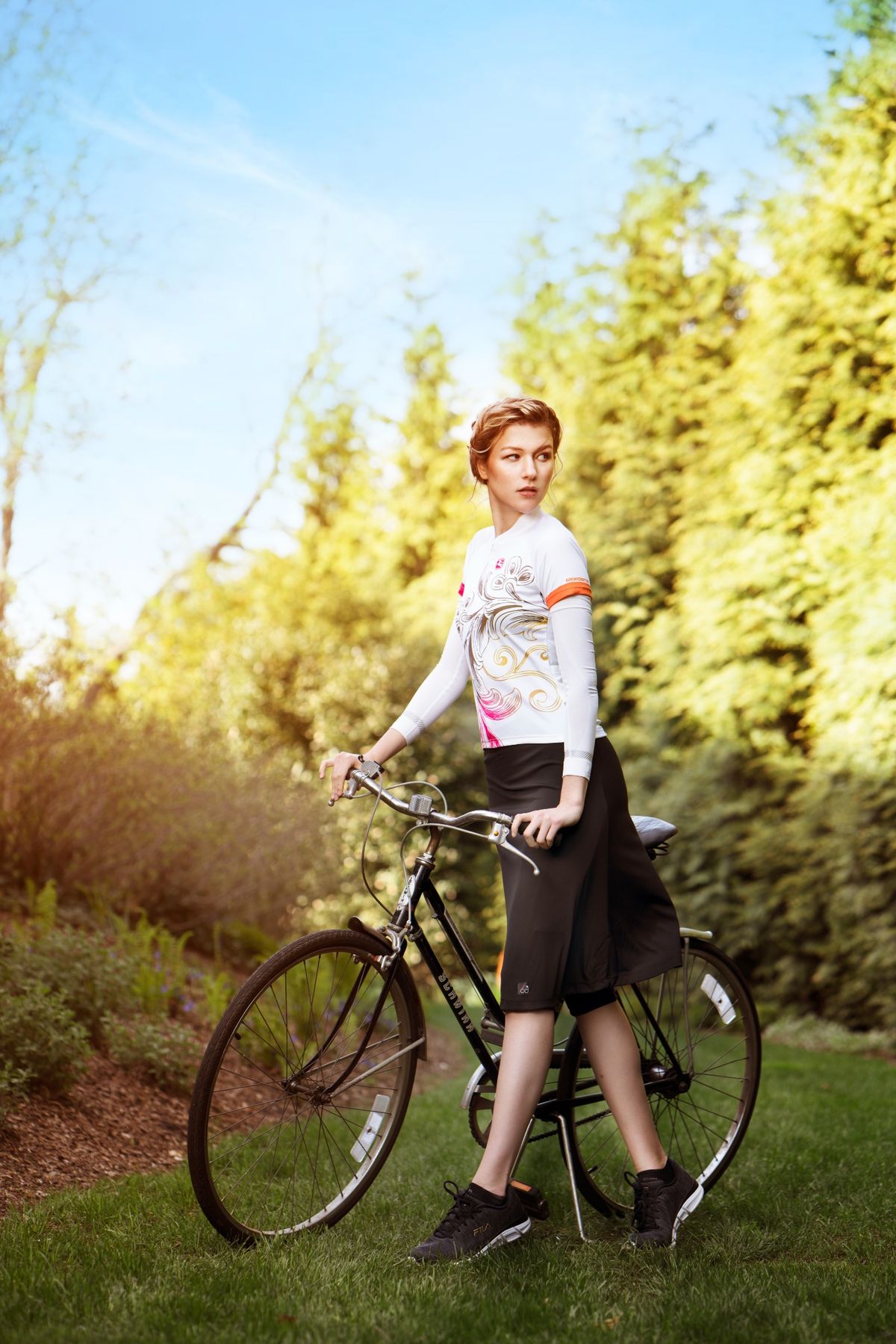 standing next to bike
